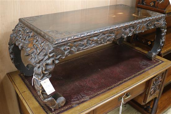 A Chinese carved hardwood opium table W.102cm